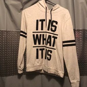 A black with faded silver color long sleeve shirt